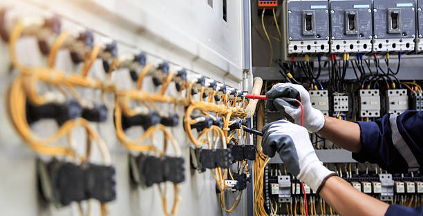 Professional Electrician technician working in Monson Center, MA
